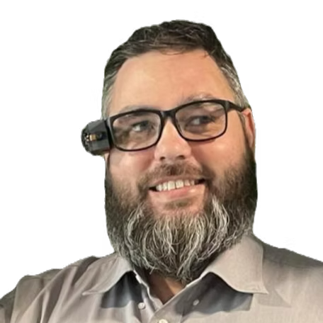 Bryan smiling at the camera